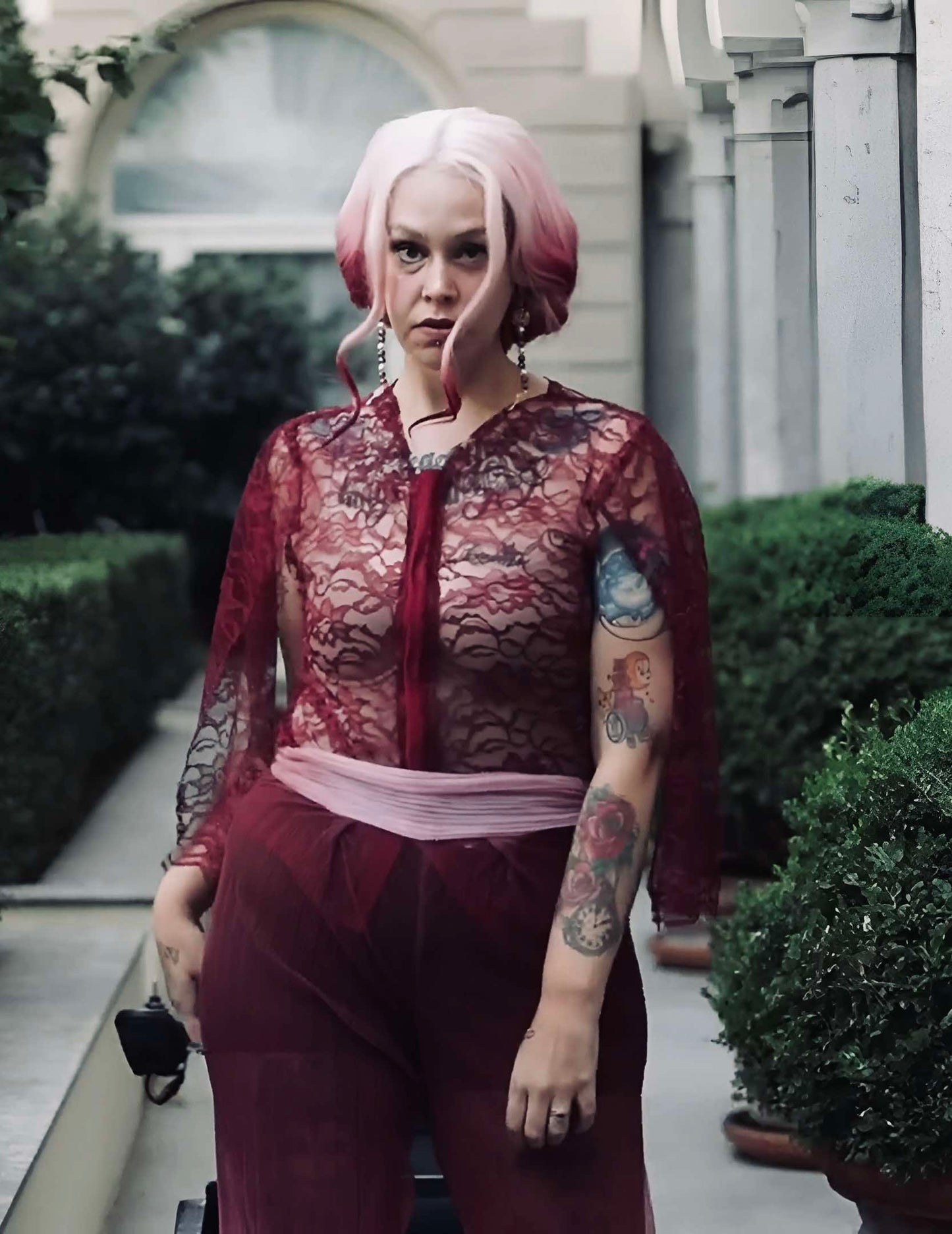 This photo shows a Burgundy Blouse made of lace