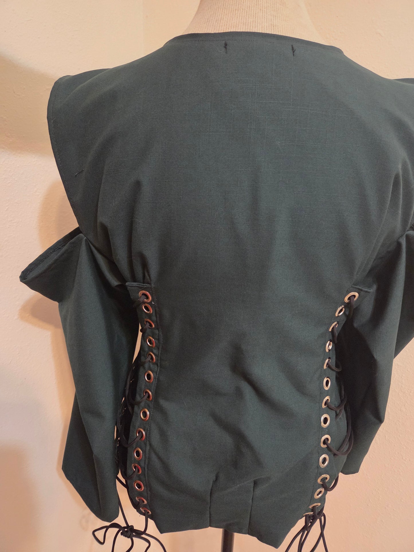 This photo shows the backside of our size adjustable blazer
