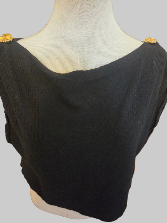 Tis photo shows a black, knit size-adjustable top with two button accents on the shoulders. 