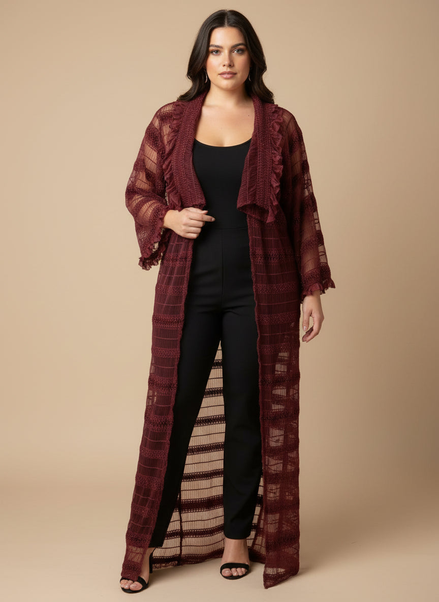 This photo shows a model wearing a size inclusive red overcoat with transparent red fabric. Fits multiple sizes